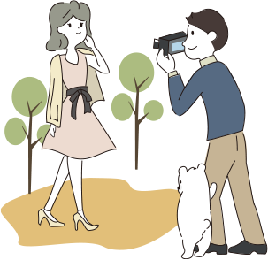 カメラで女性を撮影するイラスト